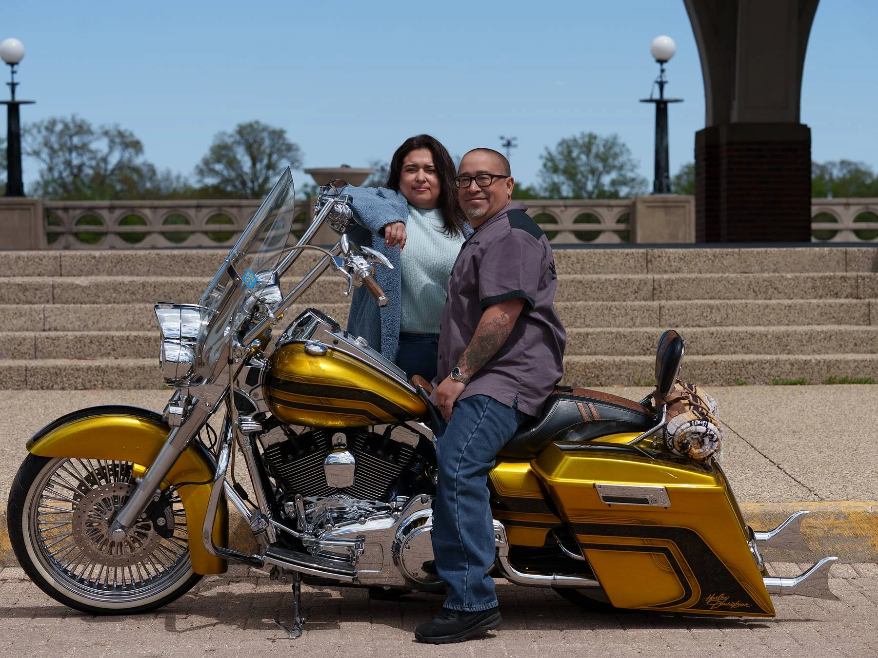 Both by the bike on the steps
