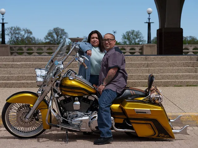 Both by the bike on the steps